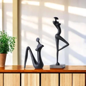 Modern metal sculpture, abstract sitting and standing figures